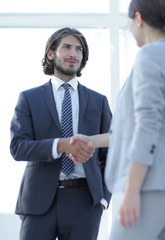 Sticker - Friendly smiling business people  handshaking after pleasant tal