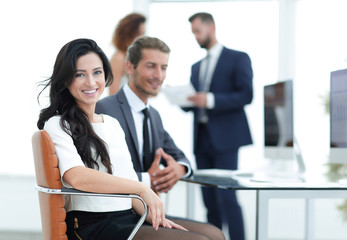 Wall Mural - couple of colleagues sitting at a Desk