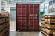 © ekkaluck - The container inside warehouse on shipment area.