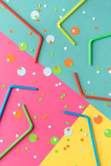 Vibrant confetti and straws