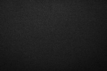 Black Fabric Texture Background. Dark Clothing Material.