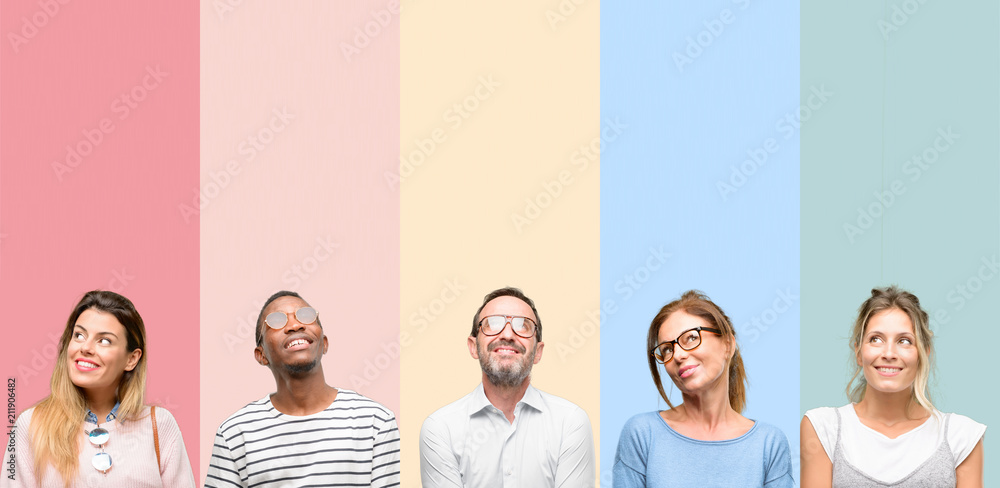Mixed group of people, women and men thinking and looking up expressing doubt and wonder - obrazy, fototapety, plakaty 
