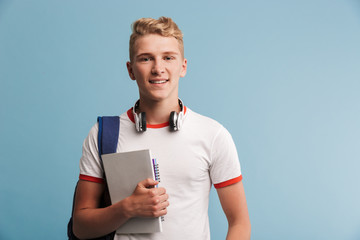 Sticker - Portrait of a happy casual teenage boy with backpack