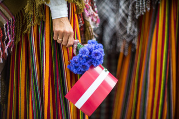 Wall Mural - Song and dance festival in Latvia. Procession in Riga. Elements of ornaments and flowers. Latvia 100 years.