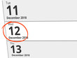 © Eigens - Date Wednesday 12 December 2018 circled in red on a calendar