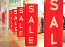 Sale Red Signs At Retail Store