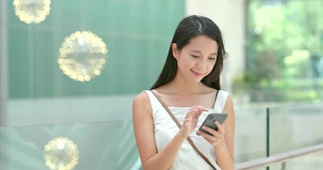 Poster - Woman use of smart phone in shopping mall