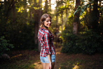 Wall Mural - pretty woman hiking in forest