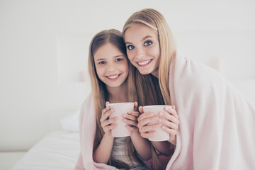 Canvas Print - Enjoy time chat conversation lifestyle winter autumn warmth close relatives concept. Beautiful joyful excited pretty with toothy smile ladies having tea party at home covering shoulders with plaid