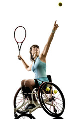 one caucasian young handicapped tennis player woman in welchair sport tudio in silhouette isolated on white background