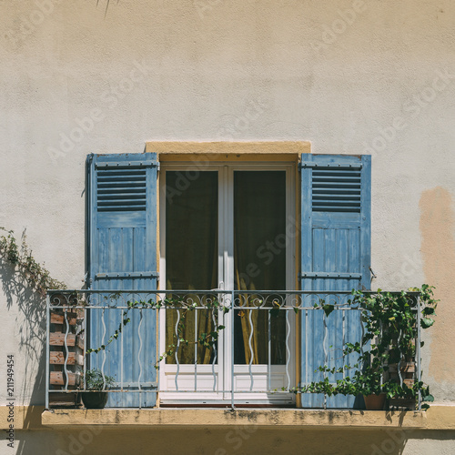 bright-blue-shutters-balcony-in-provence-france