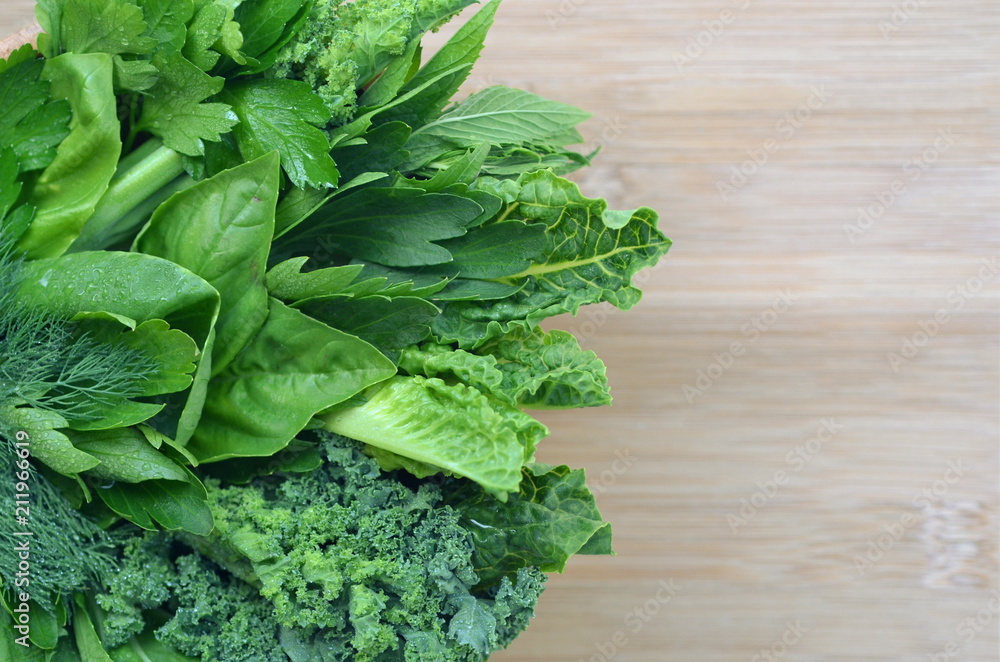 Top view flat layout of fresh culinary herbs and green leafy vegetables ...