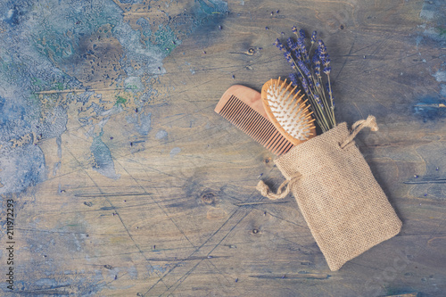 Fotomural Wooden Scalp and Massage brush and hair comb with natural lavender on the rustic