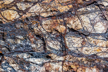 Wall Mural - Stones texture and background. Rock texture with beautiful colors and great leading lines