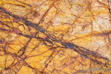 Wall Mural - Stones texture and background. Rock texture with beautiful colors and great leading lines