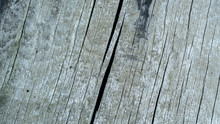 Gray Diagonal Wood Texture With A Separation Crack