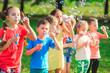 © davit85 - Group of children blowing soap bubbles