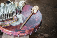 Ancient Amerindian Tambourine, Drum Drumstick Replica And A Feather Headdress.