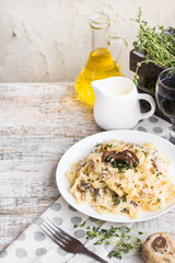 Wall Mural - Fetuchini alfredo with mushrooms and chicken ham in creamy cheese sauce