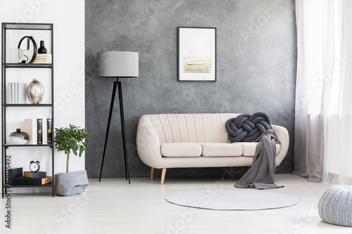 Poster Mock Up On A Gray Concrete Wall And A Leather Beige