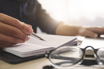 Business man working in a office and documents data