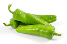 Green Vegetables. Organic Fresh Long Green Peppers Or Green Chilli Horizontal Isolated On White Background, With Clipping Path.