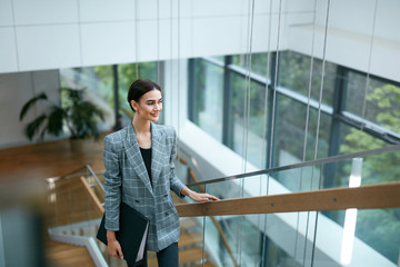 Business Woman Going To Work In Office Portrait