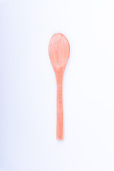 Wooden spoon isolated on white background