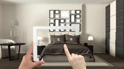 Wall Mural - augmented reality concept. hand holding tablet with ar application used to simulate furniture and in