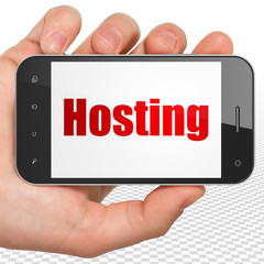 Web development concept: Hand Holding Smartphone with red text Hosting on display, 3D rendering