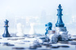 © TimeStopper - double exposure image of the coin stack which has the Staunton chess set such as king on top and overlay with cityscape image. the concept of accounting, business, financial, economy and investment.