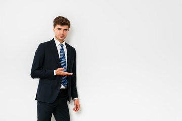 handsome elegant man in suit on white