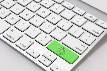 White keyboard with a green 