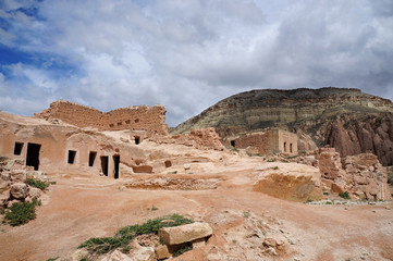 Ruins of old stone houses in Chavushin. Turkey, Cappadocia