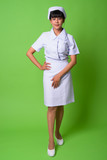 Fototapeta Lawenda - Young beautiful Asian woman nurse