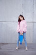 © Абай Бекенов - Pretty skater girl holding skateboard