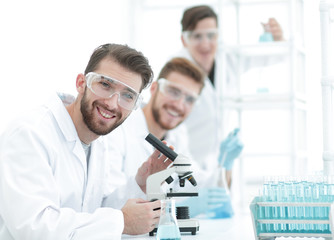 Wall Mural - closeup.a group of scientists in the workplace.