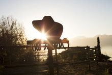 Cowboy Hat In The Sunset On A Farm