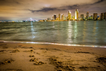 Fototapete - San Diego Skyline with beach and bay as seen from Coronado  