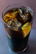 © Vladimirov - Glass  with cola lemon and ice like whiskey cola or long island cocktail