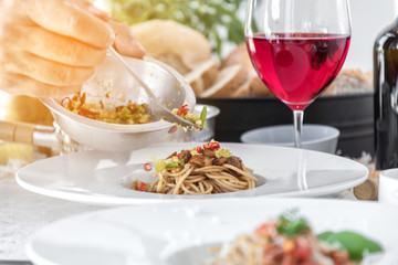 Wall Mural - Close up low angle view of a plate of spaghetti topped with delicious bolognaise sauce