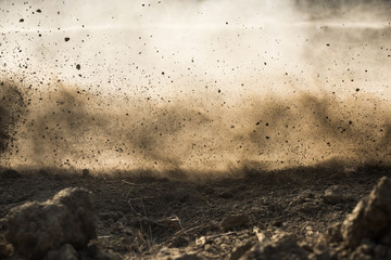 dirt fly after motocross roaring by