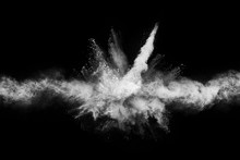 Launched White Powder, Isolated On Black Background.