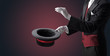 © ra2 studio - Illusionist white hand wants to conjure with magic wand from a black cylinder something