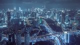 Fototapeta  - aerial view of buildings and highway interchange at night in Shanghai city