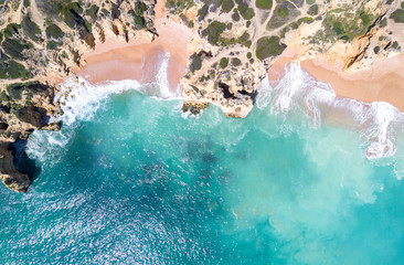 Wall Mural - Aerial view of tropical sandy beach and turquoise ocean.