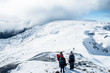 © Klanarong Chitmung - People hiking on the beautiful snow mountains. kahurangi national park, New Zealand.