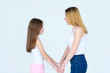© golubovy - mother and daughter holding hands. love and happiness of parenting. family feelings expression. togetherness and happy life
