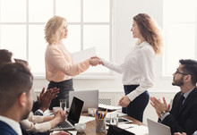 Boss Handshaking Employee Congratulating With Promotion