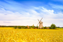 Wooden Windmill On Background Field And Sky. Dudutki Village, Minsk Region, Belarus